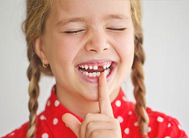 pedodonzia bambina senza un dente